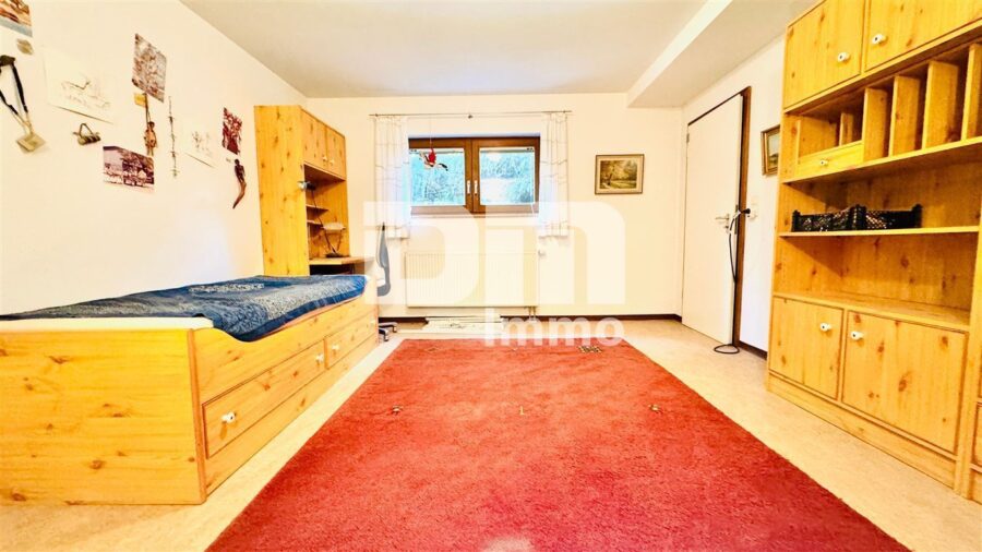 Zwei hochwertige Premium Doppelhaushälften im Paket auf großem Gewerbegrundstück - Haus 1 Souterrain Gästezimmer beheizt